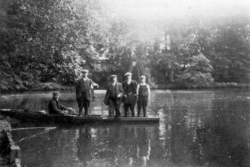 A Fishing Party at the Abbey Lake, 1920s Fishing party, Abbey Lake, early \'20\'s. Mr. T. Taylor holding his catch.